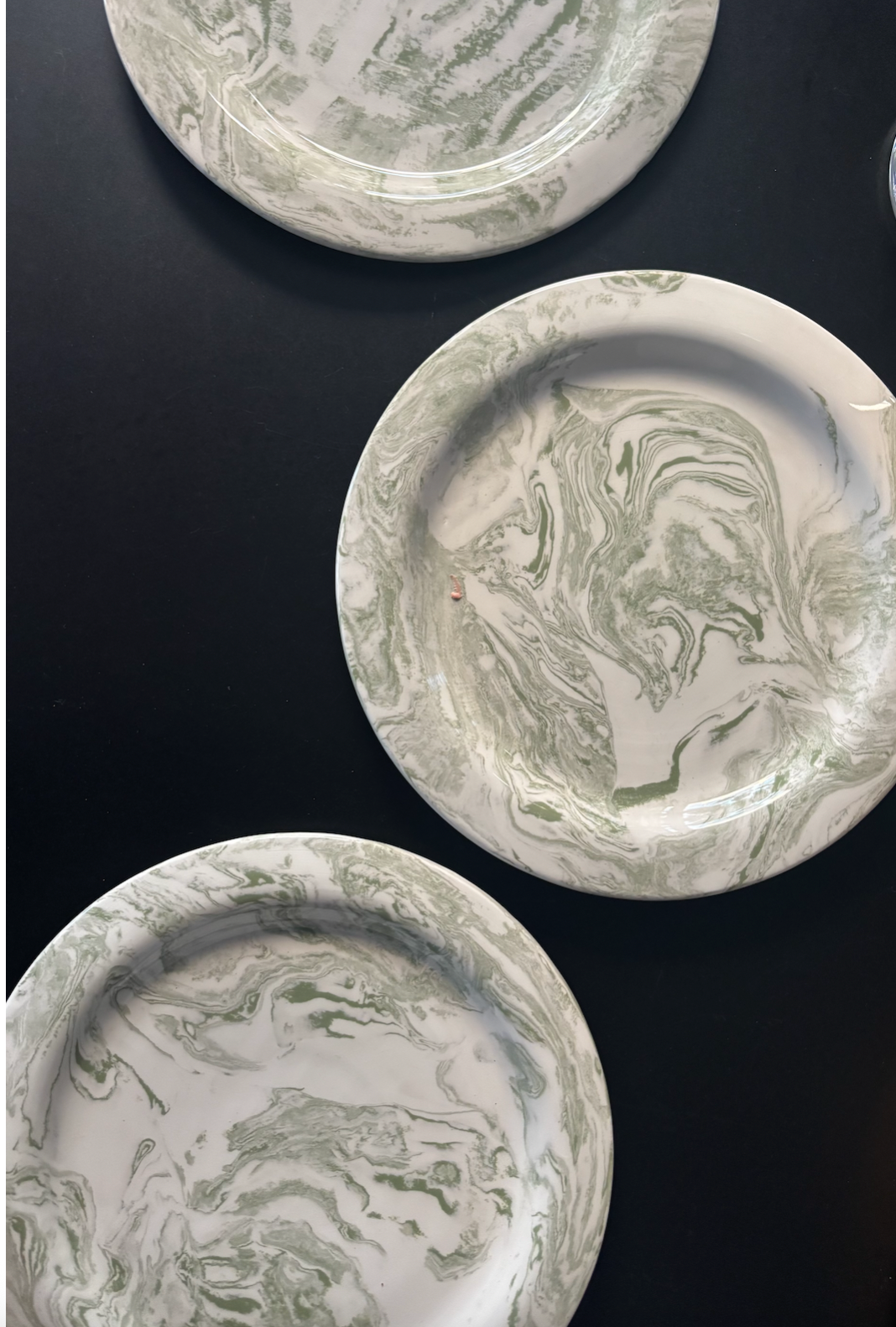 set of 2 - light green marbelized ceramic plates